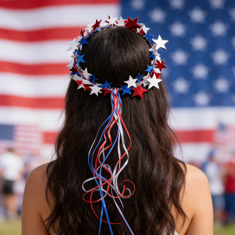 Women's festive star headpiece with flexible wire crown and long ribbons Bowlift