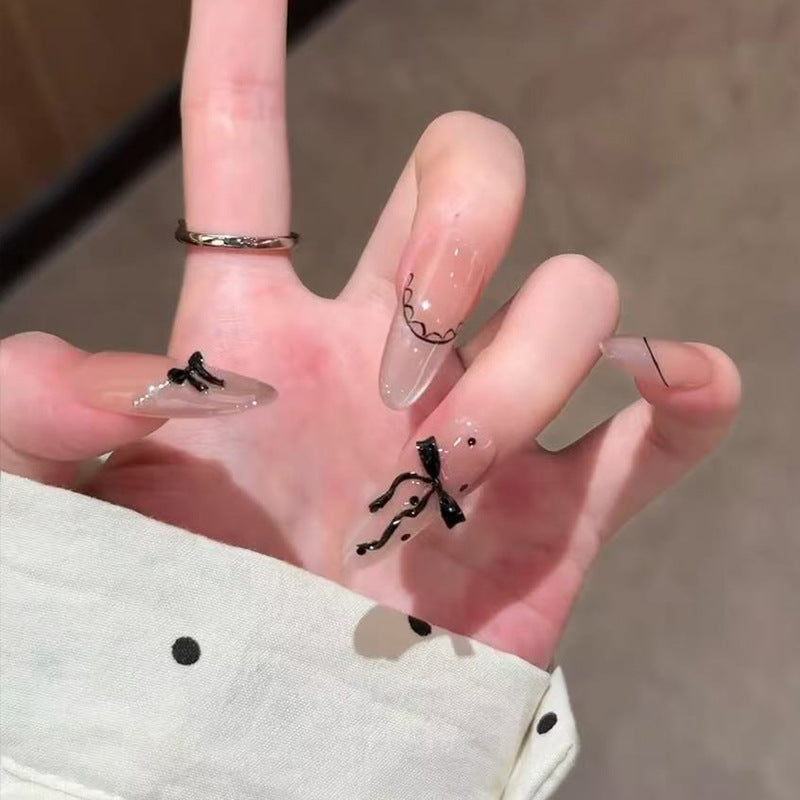 Artistic Press-On Nail Set with Elegant Bow and Pattern Details Bowlift