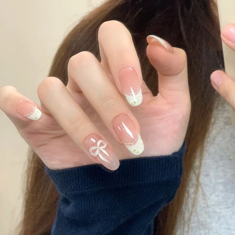 Artistic Nail Design with Decorative Elements Bowlift
