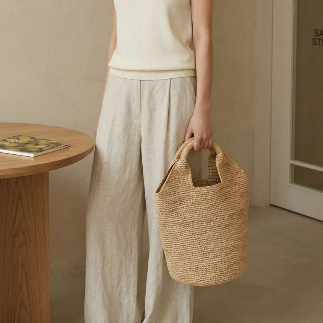 Beach bag made of natural raffia with practical handles Bowlift