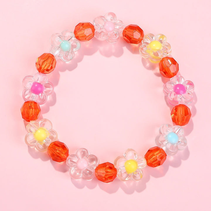 Friendship bracelet with colorful flower motifs Bowlift