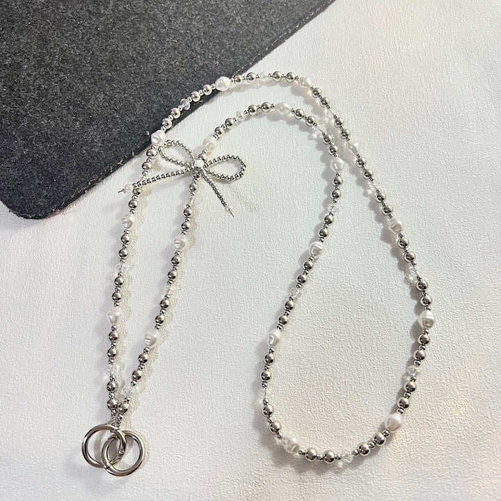 Elegant Pearl and Silver Necklace Bowlift