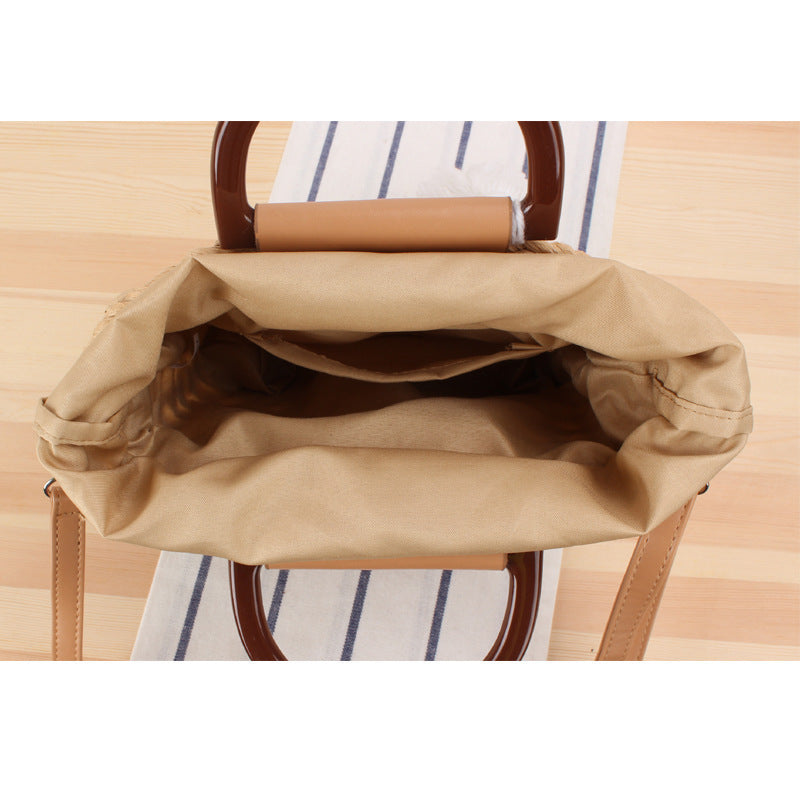 Designer handbag with stylish wooden handle and practical detachable shoulder strap Bowlift