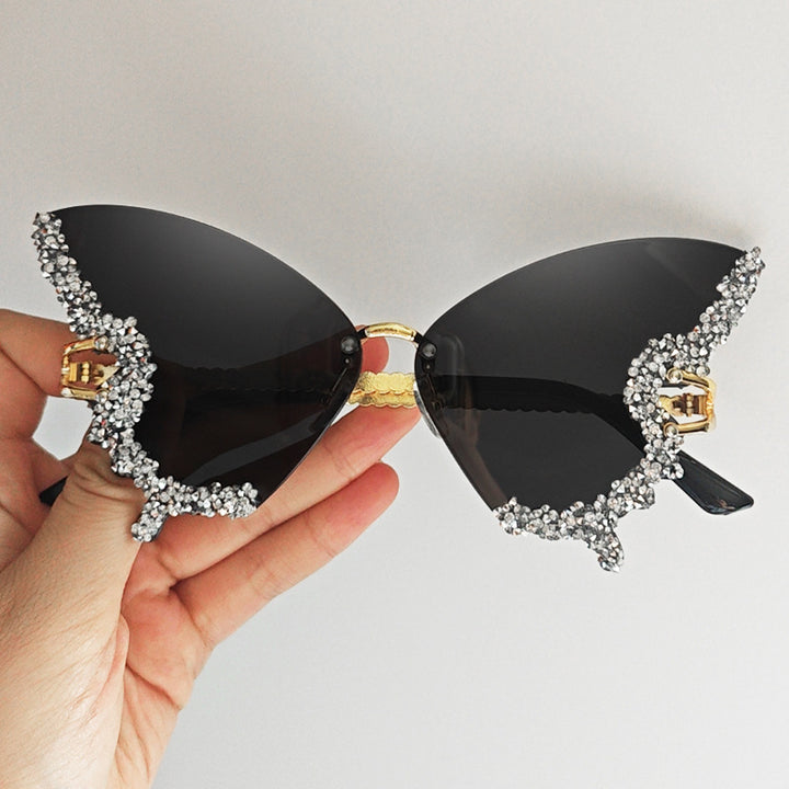 Women's extravagant sunglasses with sparkling butterfly design Bowlift