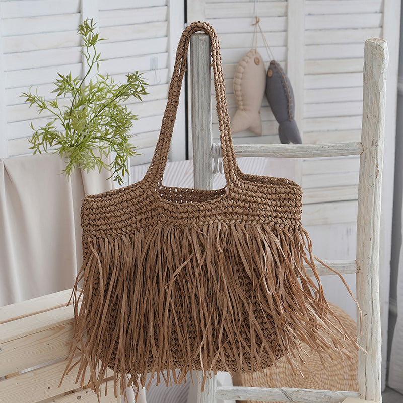 Trendy raffia bag with fringed details Bowlift