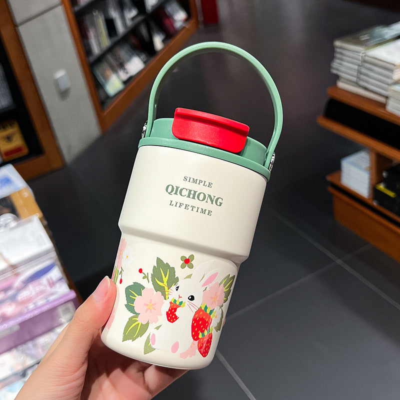 Women practical insulated drinking bottle with integrated carrying handle Bowlift