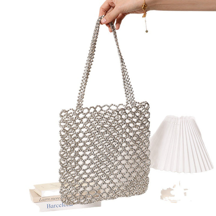 Sparkling Net Handbag Made of Braided Material Bowlift