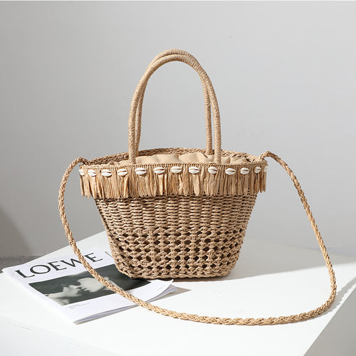 Braided straw bag with decorative tassel detail Bowlift