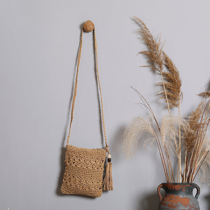 Handmade macrame shoulder bag with tassel detail Bowlift