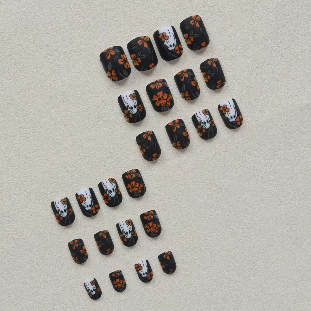 Acrylic nail set with spooky ghost design and floral accents Bowlift