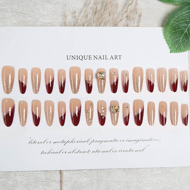 Acrylic nail set with elegant glitter design and exclusive embellishments Bowlift