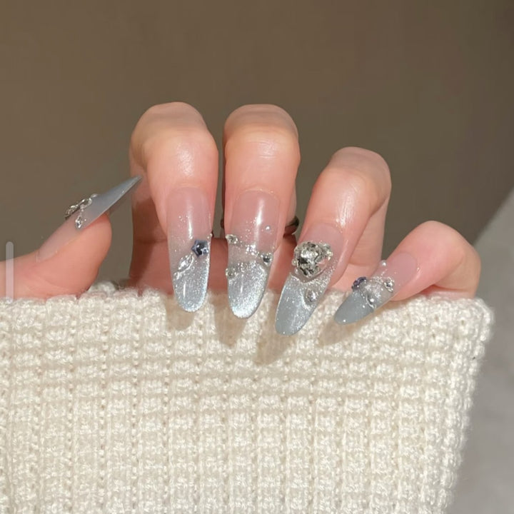 Artificial nails with modern glitter design Bowlift