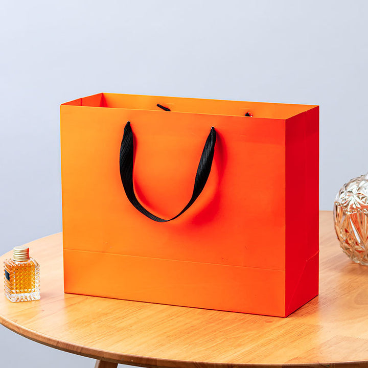 Premium Reusable Paper Gift Bag with Ribbon Handles and Reinforced Base Bowlift