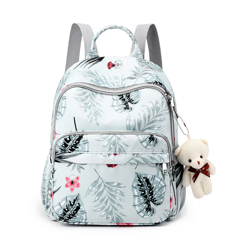 Backpack with Botanical Print and Multifunctional Compartments Bowlift
