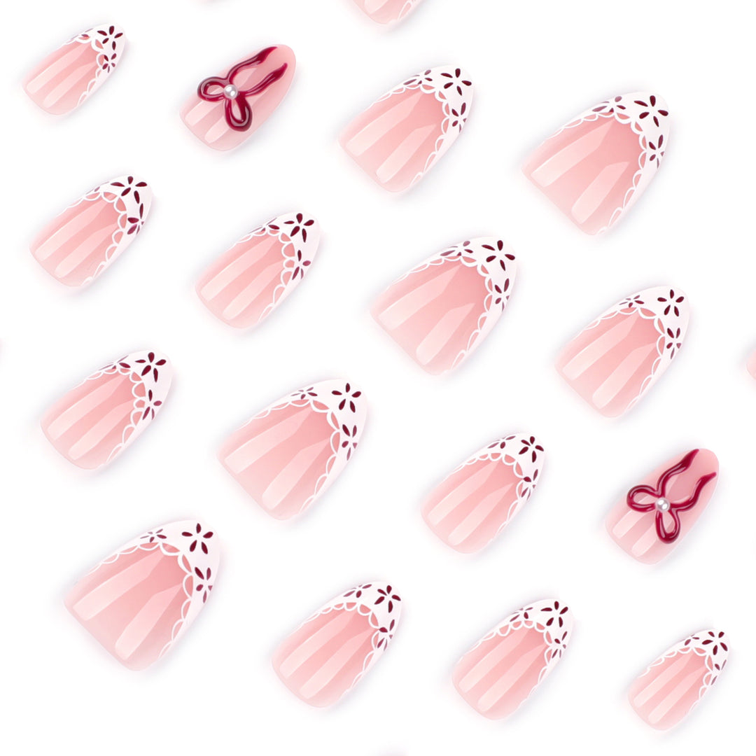 Artful stiletto nails with delicate floral accents Bowlift