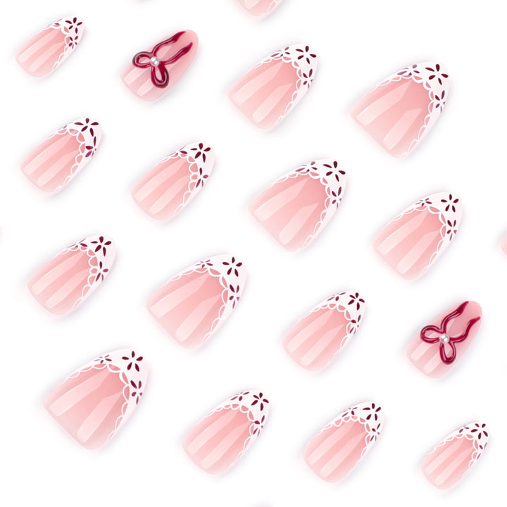Artful stiletto nails with delicate floral accents Bowlift