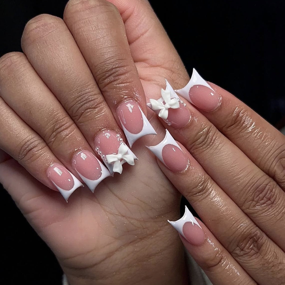 Elegant Stiletto Nail Art Extensions with Bow Accents Bowlift