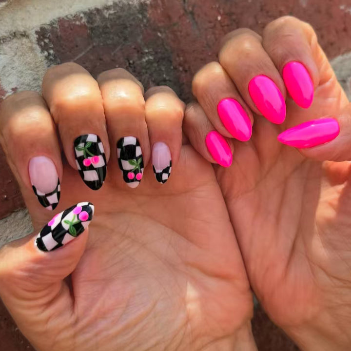 Creative artificial nails with playful cherry and checkerboard design Bowlift