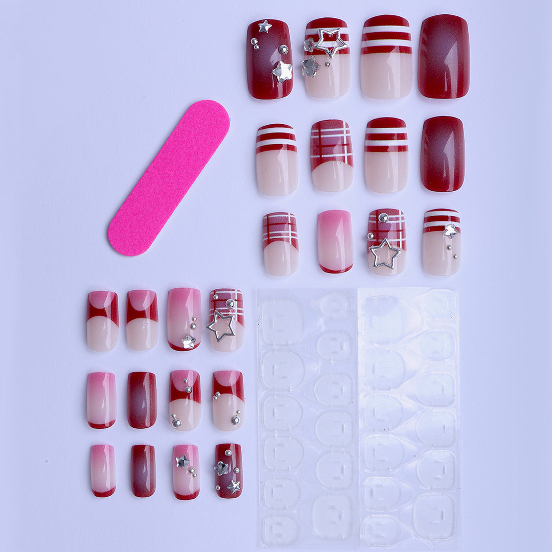 Artificial fingernails with handcrafted star decorations Bowlift