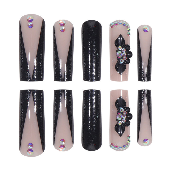 Glamorous Long Stiletto Press-On Nails with Glitter and Floral Accents Bowlift