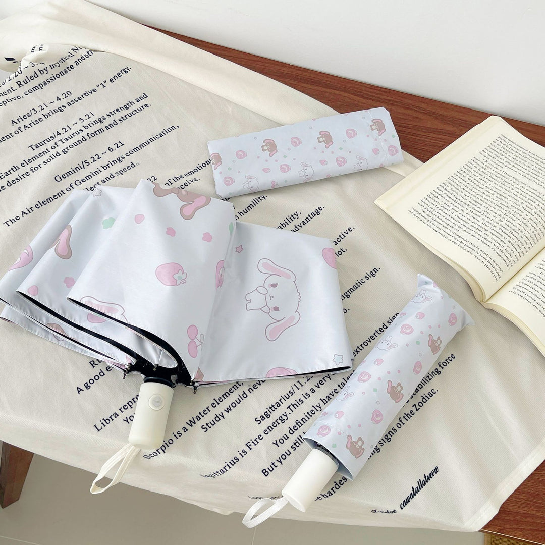Women's Automatic Folding Umbrella with Playful Animal Design Bowlift