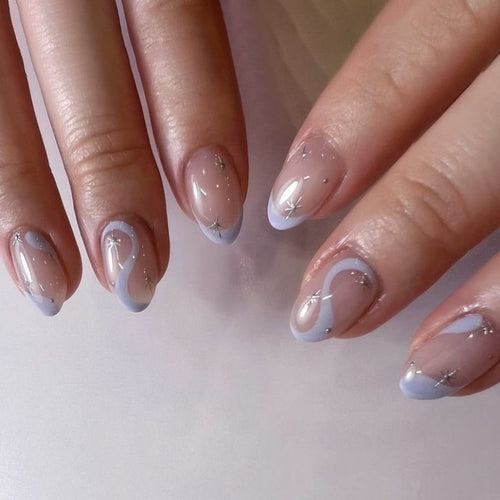 Artful nail art with elegant wave lines and glitter effects Bowlift