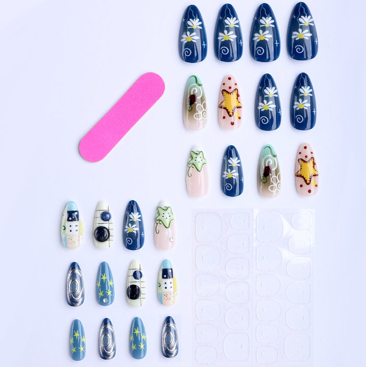Artificial nails with creative maritime designs and 3D elements Bowlift
