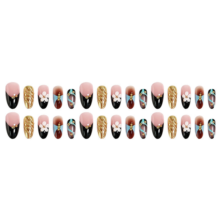 Artificial nail set with filigree floral decorations and glamorous accents Bowlift