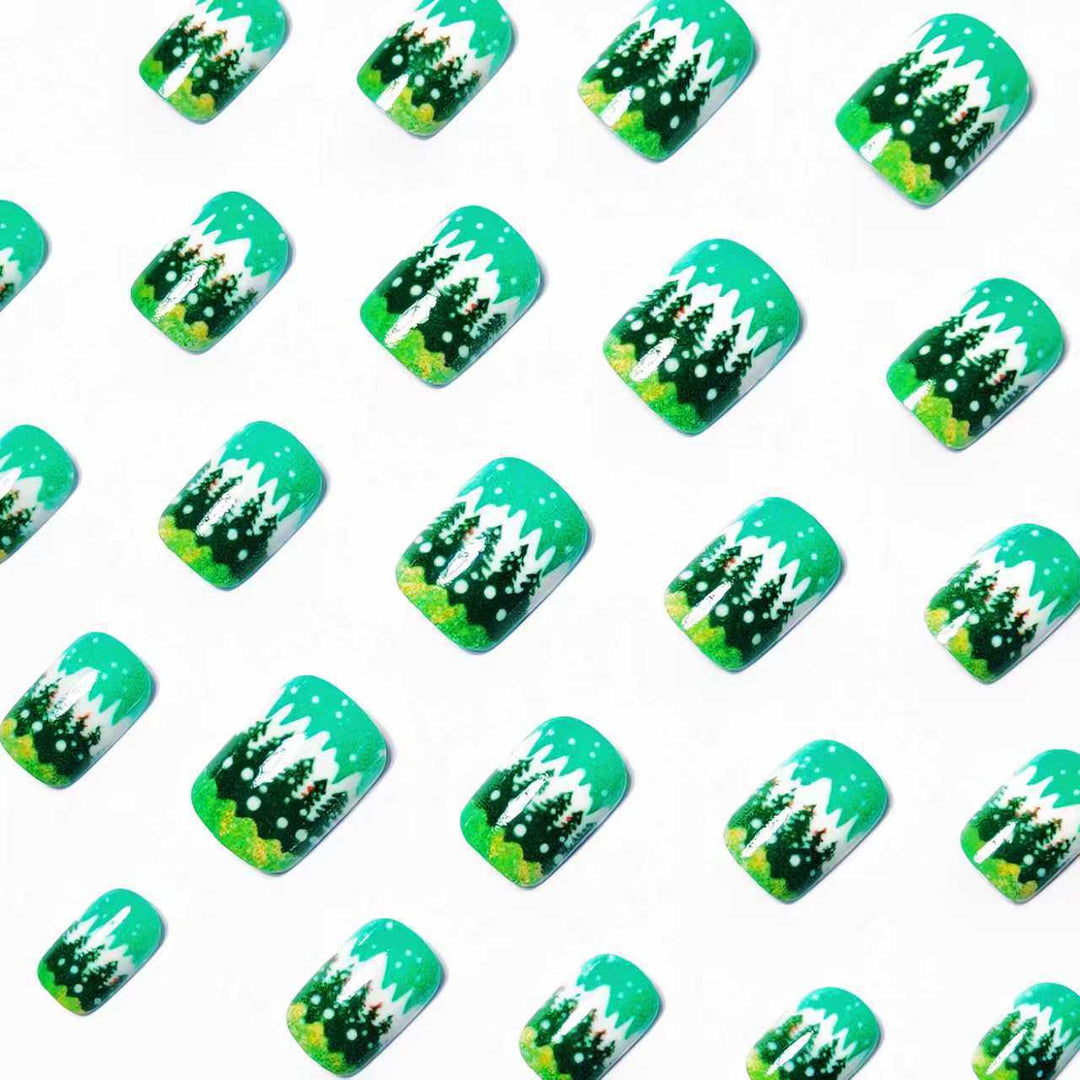 Artificial nails with winter-themed Christmas tree design Bowlift