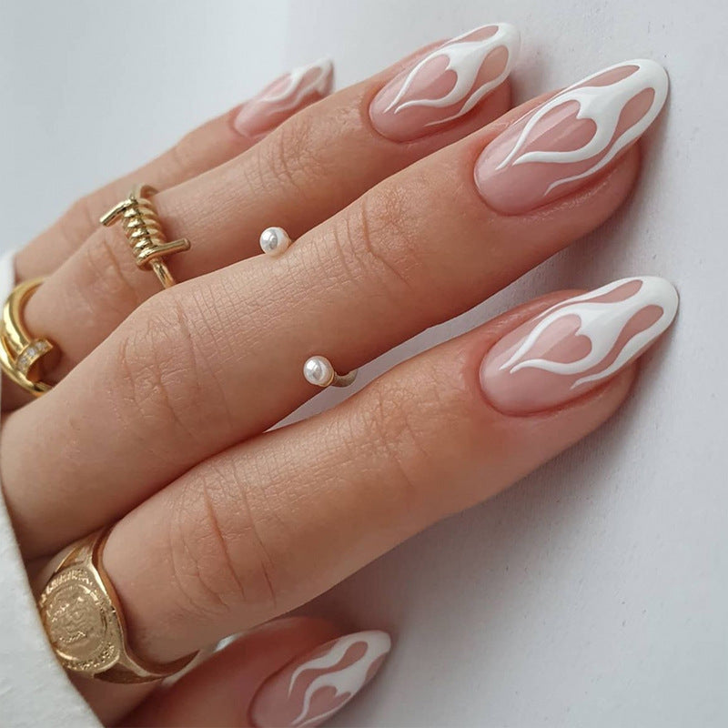 Artful stiletto nails with heart-shaped accents Bowlift