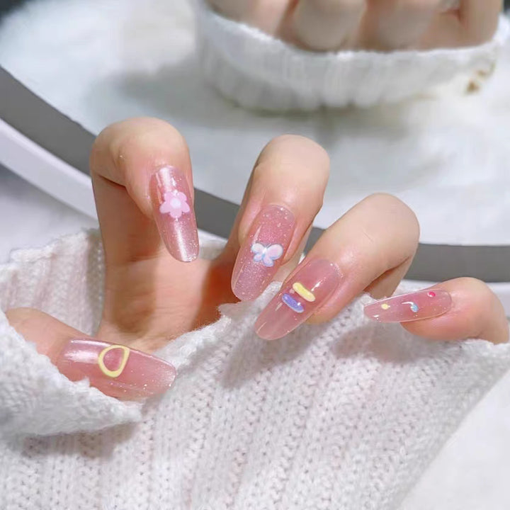 Artistic Press-On Nail Set with Floral and Glossy Accents Bowlift