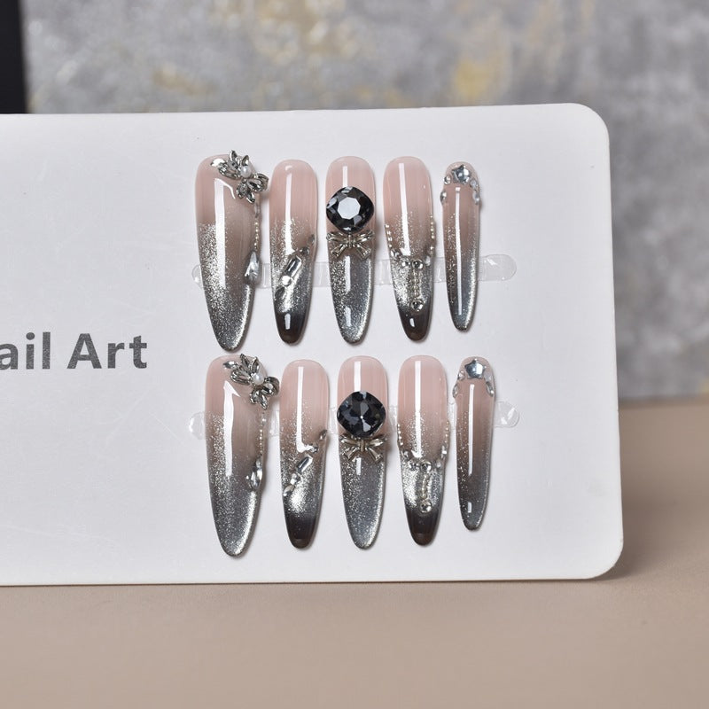 Artistic Crystal-Embellished Stiletto Nail Extensions Bowlift