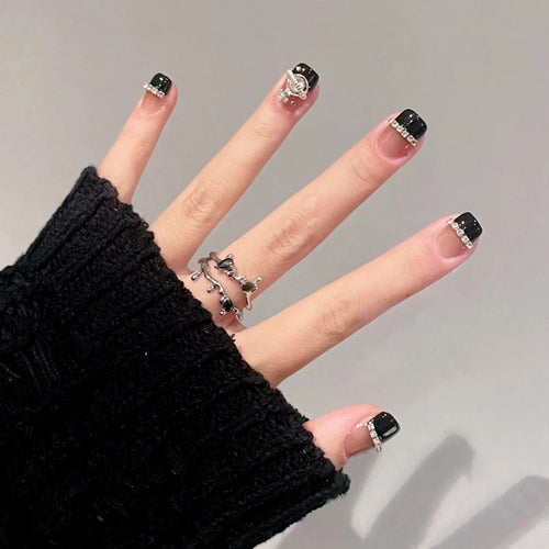 Decorative Press-On Nail Art with Elegant Black Tips Bowlift