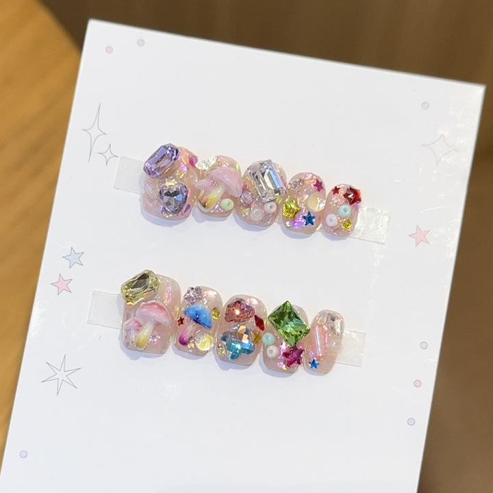 Artificial nails with sparkling crystal accents Bowlift