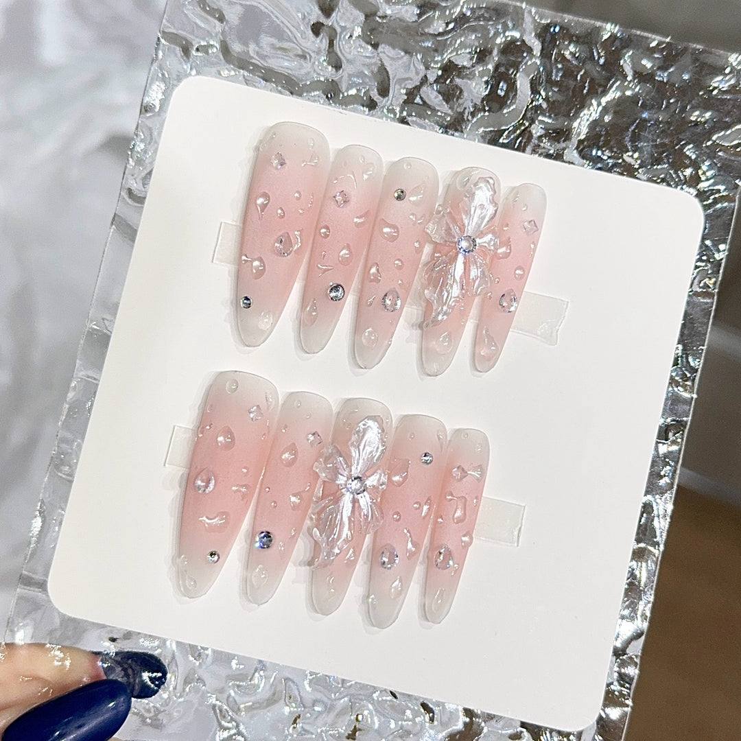 Glamorous artificial nails with sparkling accents Bowlift