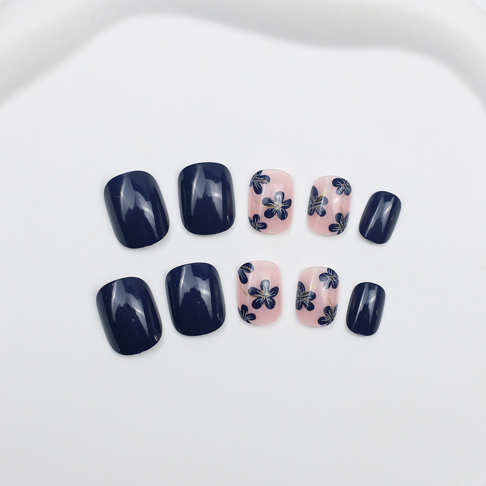 Artificial nails with floral designs and glossy accents Bowlift