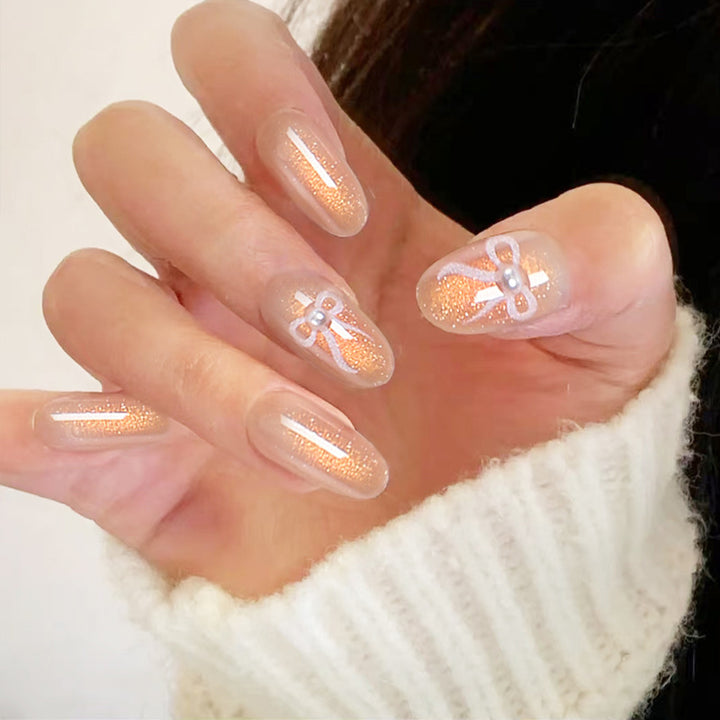 Glamorous artificial nail tips with glitter accents Bowlift