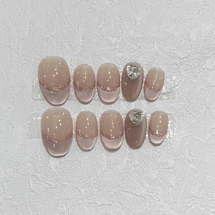 Elegant Press-On Nail Set with Jewel Accents Bowlift