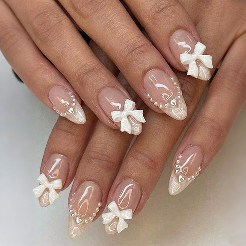 Decorative Press-On Nail Art Set with Elegant Bow and Pearl Accents Bowlift
