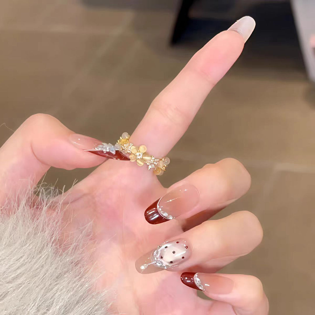 Artistic Long Stiletto Press-On Nail Set with Bow and Gemstone Accents Bowlift