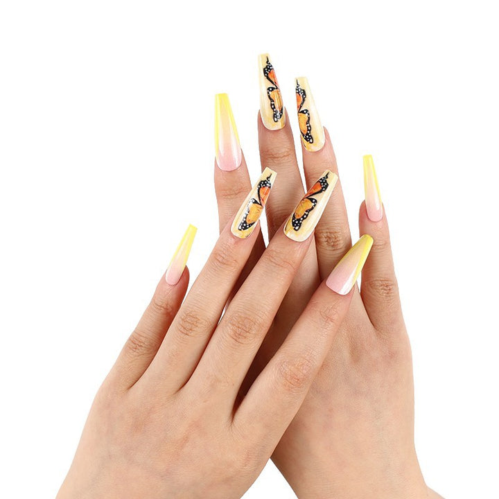 Art nails with butterfly motif Bowlift