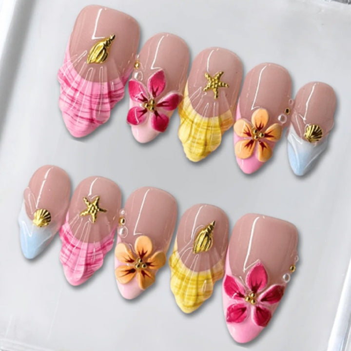 Artificial nail set with floral patterns and sparkling accents Bowlift
