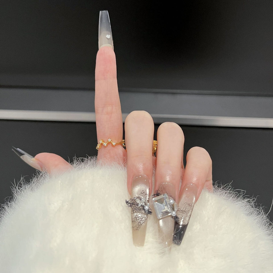 Artistic Press-On Nail Set with Unique Lace and Gemstone Accents Bowlift