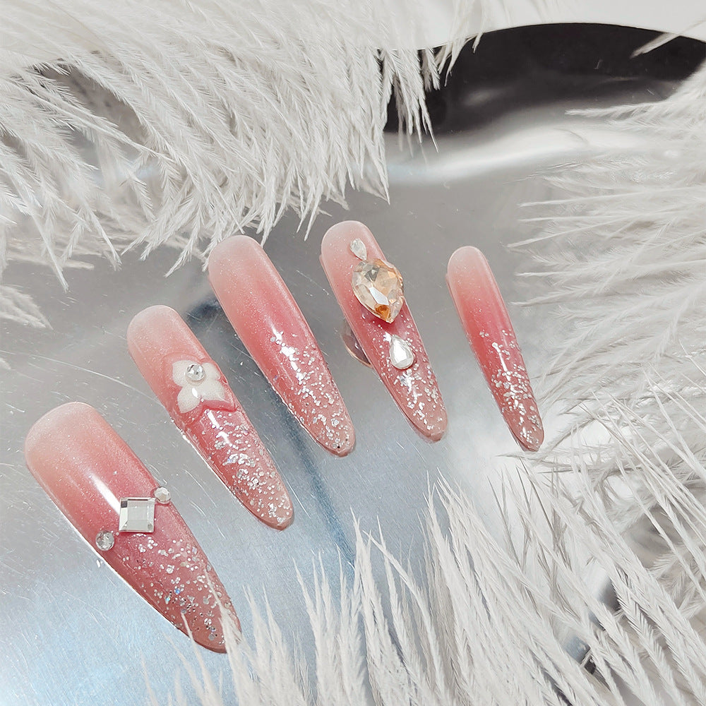 Shiny artificial nails with rhinestones and glitter Bowlift