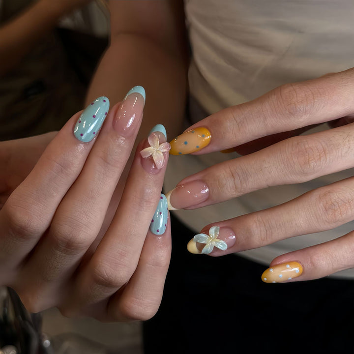 Artificial Hand Nail Art with Floral Accents Bowlift
