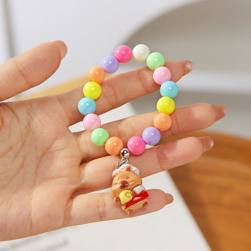 Colorful children's bracelet with crafted pendant Bowlift