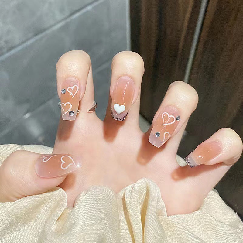 Artful nail tips in heart design Bowlift