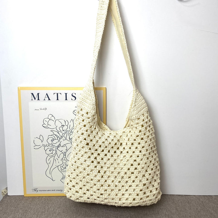 Hand-knotted shoulder bag in modern net design Bowlift