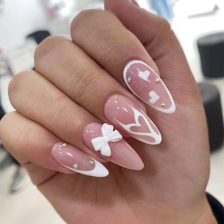 Artistic stiletto nails with heart design Bowlift