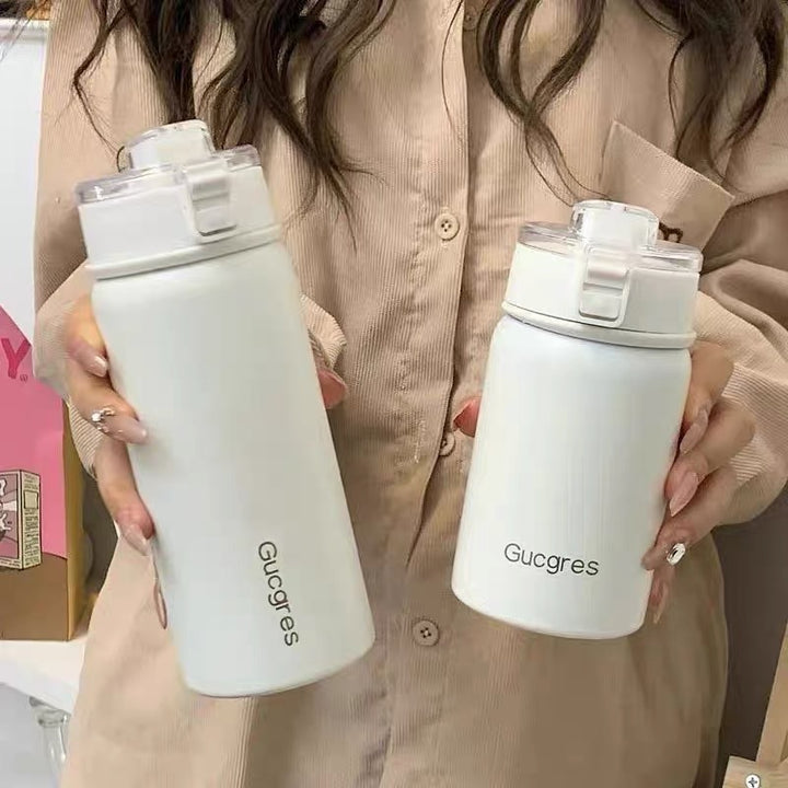 Ladies insulated drinking vessel with innovative flip lid Bowlift